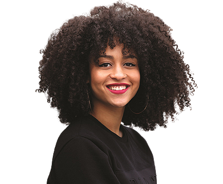 Smiling girl with afro